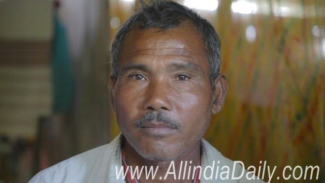 Jadav Payeng with a serious face and mustache while wearing a white shirt