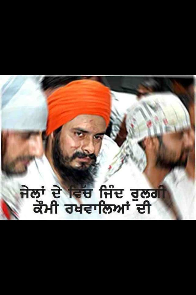 Jagtar Singh Hawara looking serious with a beard and mustache while wearing a white shirt and an orange turban