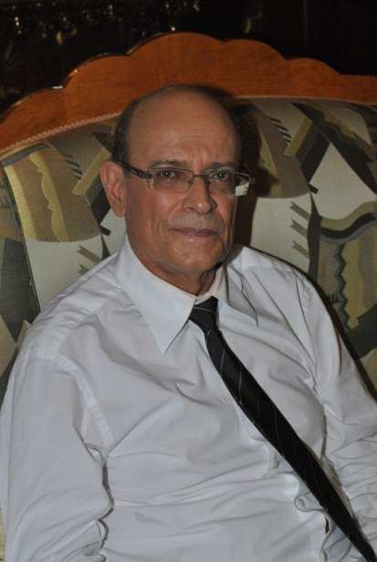Jaime Fabregas wearing white long sleeves and black neck tie