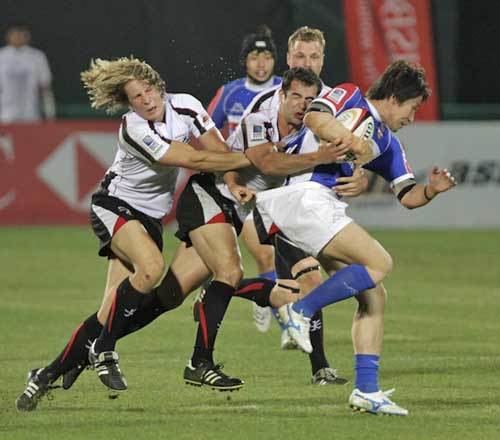 James Love (rugby union) Arabian Gulfs James Love and Taif al Delamie tackle Koreas Park