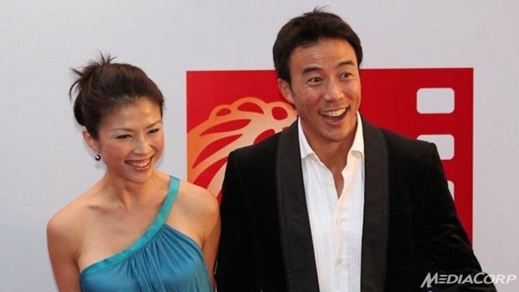 James Lye and Wong Li Lin wearing a formal attire