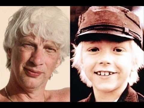 Jan Ohlsson (left image) smiling and has white hair wearing a gold necklace. On the right image is young Jan Ohlsson smiling with his white hair wearing a brown hat and brown polo