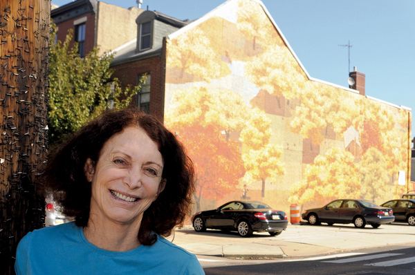 Jane Golden She uses paint brushes and volunteers to clean up graffiti and