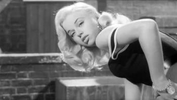 Diana Dors with curly blonde hair