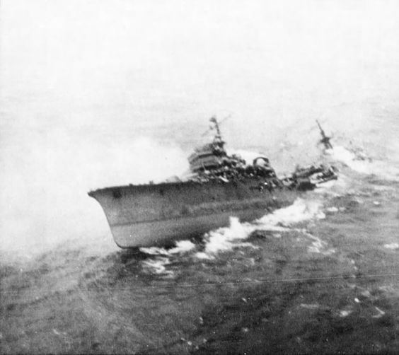 Japanese cruiser Nachi Photo Japanese cruiser Kashii sinking by the stern after being