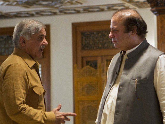 Nawaz Sharif talking to a guest inside Raiwind Palace found in Jati Umra.