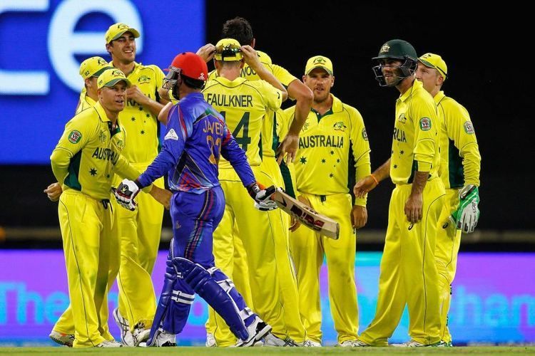 Australia celebrates after taking the wicket of Javed Ahmadi of