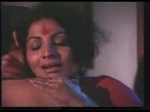 A scene from one of the movies of Jayabharathi with a naked man.