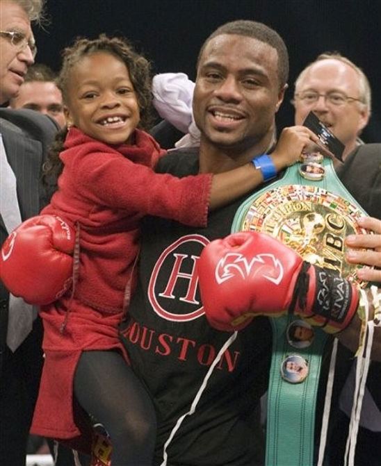 Jean Pascal BOXER JEAN PASCAL TRIUMPHS WITH HIS LITTLE ANGEL BY HIS SIDE