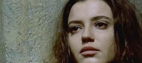 Jenny Tamburi in a movie scene from Women in Cell Block 7 (1973 film).