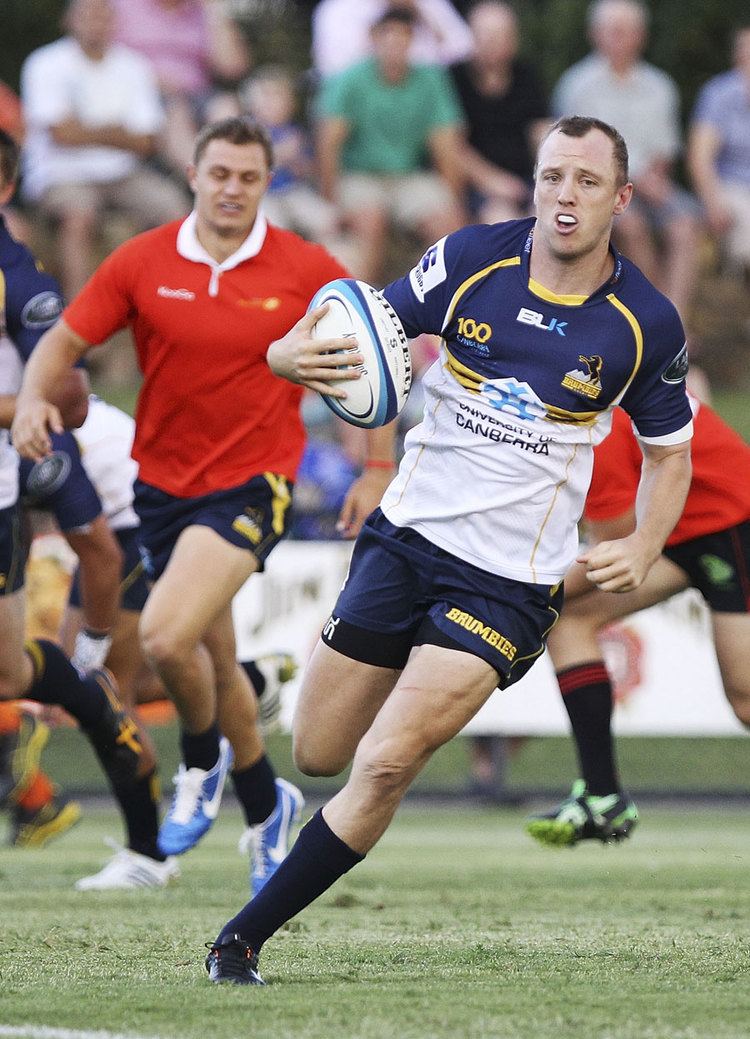 Jesse Mogg Jesse Mogg of the Brumbies runs over to score during the