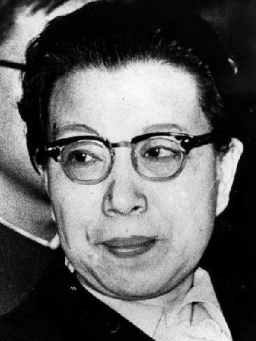 Jiang Qing wearing eyeglasses