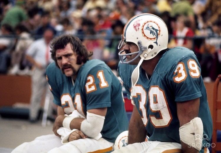 Former Miami Dolphins running backs Jim Kiick, left, and Mercury Morris,  right, smile at Independence Hall assisted living facility in Wilton  Manors, Thursday, Dec. 6, 2018. Both were teammates on the 1972