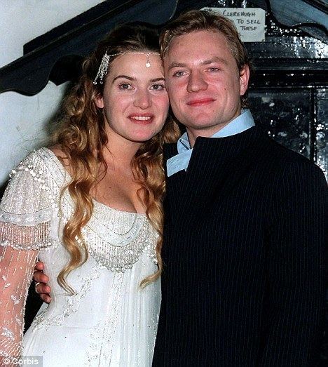 Jim Threapleton and Kate Winslet on their wedding day with a smile on their faces.