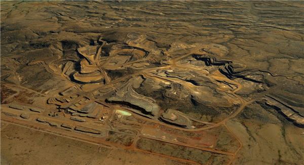 Jimblebar mine BHP cuts ribbon at its 36bn Jimblebar iron ore mine expansion