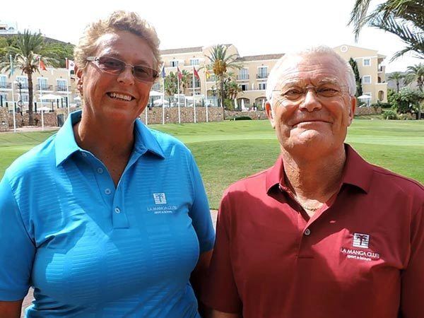 Jo Durie smiling together with a man beside him wearing red shirt