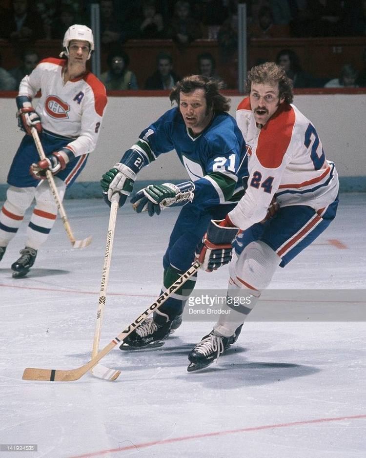 John Gould (ice hockey) John Gould 21 of the Canucks vs Don Awrey 24 of the Canadiens