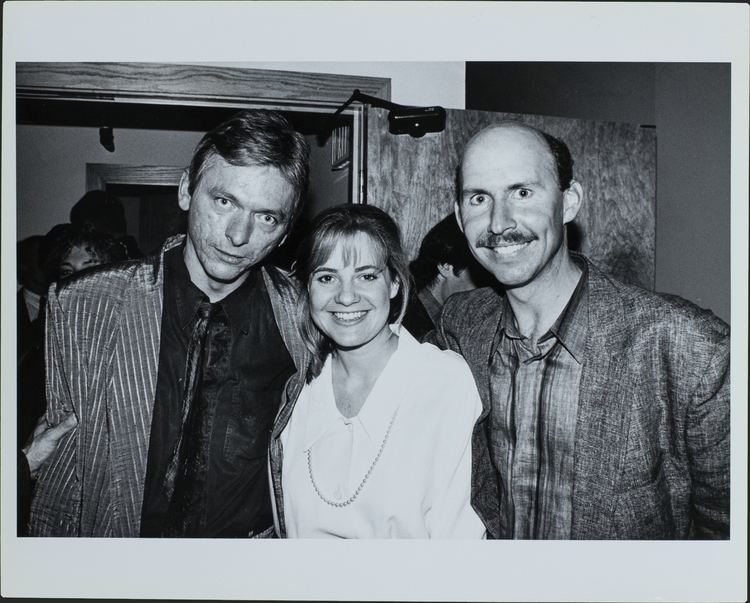 John Hemphill wearing striped vest and long sleeves, Bonnie Hunt in her white long sleeves and Don Lake wearing coat and long sleeves