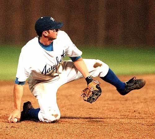 John Nelson (baseball) Photo Kansas University shortstop John Nelson looks to throw during