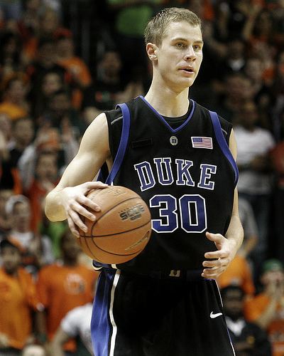 Jon Scheyer while holding a ball on basketball game against Wake Forest