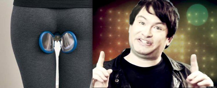 On the left is a back of a woman wearing gray leggings and on the right is Jonah Falcon wearing black leather jacket and black shirt  while pointing his fingers upward