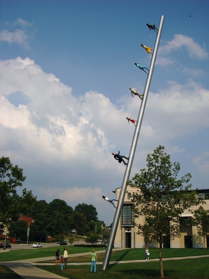 Jonathan Borofsky GravityDefying Sculpture of People Walking Up a Pole My