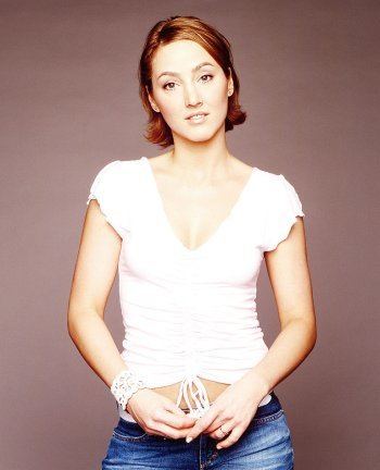 Judith Anna Pronk wearing a white shirt and blue jeans.