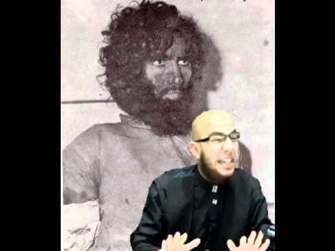 Juhayman al-Otaybi on the back with a sad face, curly hair, a mustache, and a thick beard. In the front, a bald man wearing eyeglasses, with a beard and wearing black long sleeves.