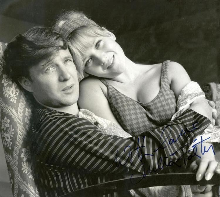 Terry Palmer hugging Julia Foster while they are on the set of Allan Prior's television drama 'They Throw It at You' in 1964
