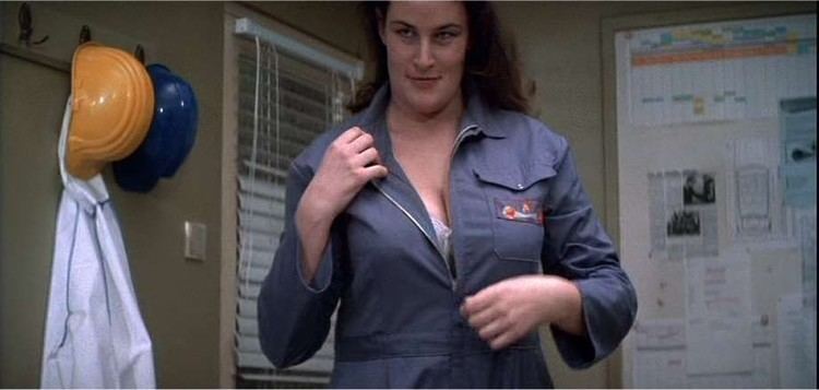 Julie T. Wallace in her blue outfit in The Living Daylights (1987)