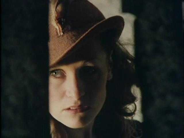 Juliet Hammond Hill looking afar while wearing a brown hat in a scene from the 1977 tv series Secret Army