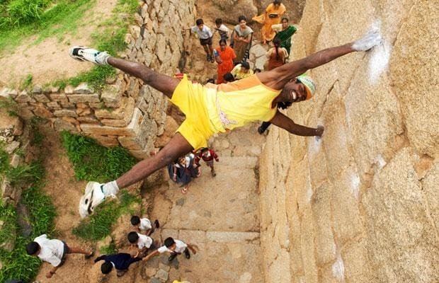 Jyothi Raj Reallife Spiderman hangs out on the side of buildings