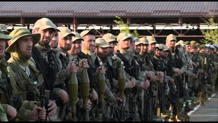 A group of armed Kadyrovtsy men