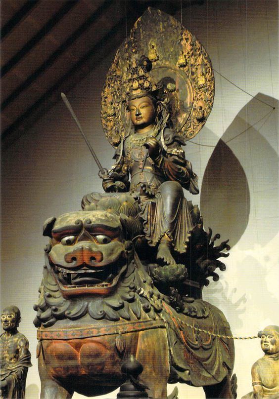 Kaikei Abe Wenshu Bodhisattva Manjusri riding a lion like wooden Kaikei as