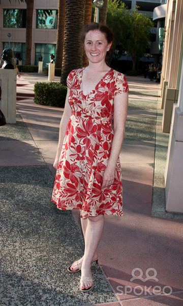 Kami Cotler wearing a red & white floral dress