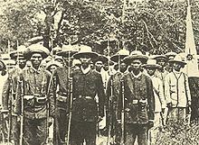 A late 19th-century photograph of armed Filipino revolutionaries, known as the Katipuneros