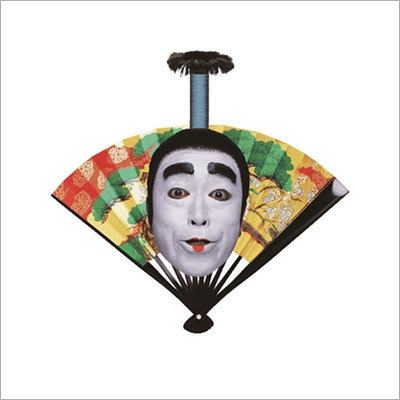A hand fan and Ken Shimura's face with make-up