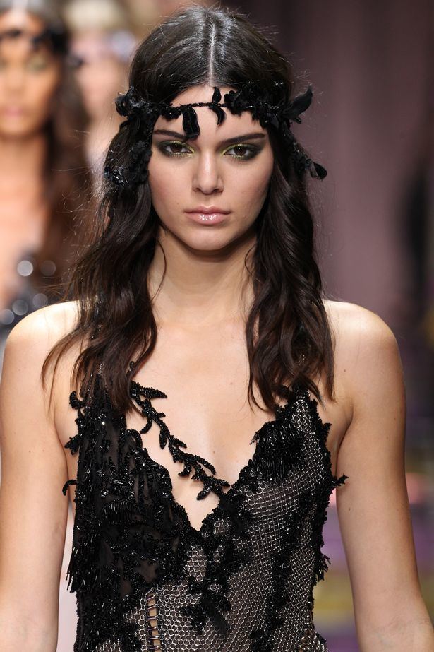 Kendall Jenner Kendall Jenner wows on the runway wearing a plunging gown