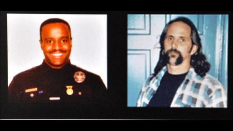 On the left, Kevin Gaines smiling while wearing a police uniform. On the right, Frank Lyga wearing blue and white checkered long sleeves and a black t-shirt