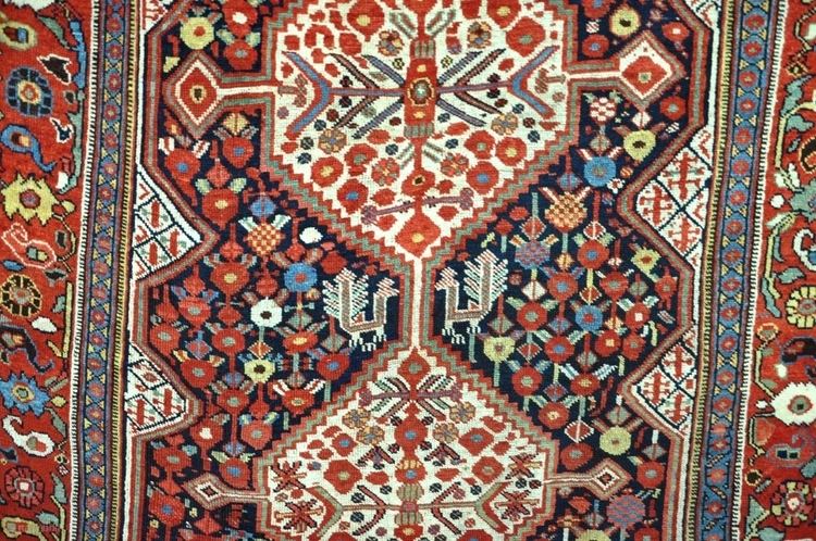 Khamseh An antique Khamseh carpet with very good dyes Even low pile very