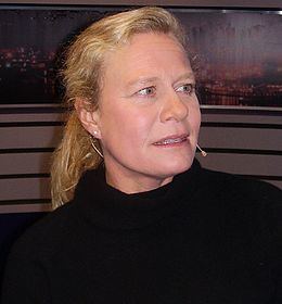 Ulrika Bidegård wearing a black jacket and earrings