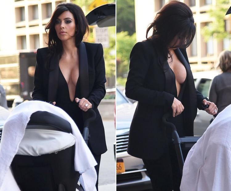 Kim West Kim goes braless on stroll with baby North in NYC The