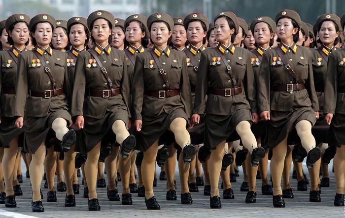 Female North Korean soldiers march across Kim II Sung Square during a military parade in Pyongyang, North Korea
