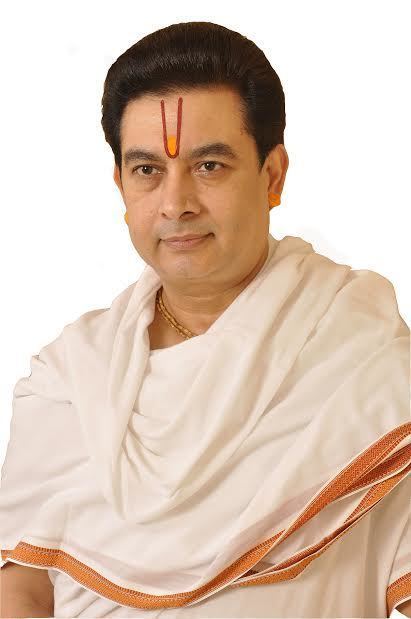 Kirit Bhaiji in a white background