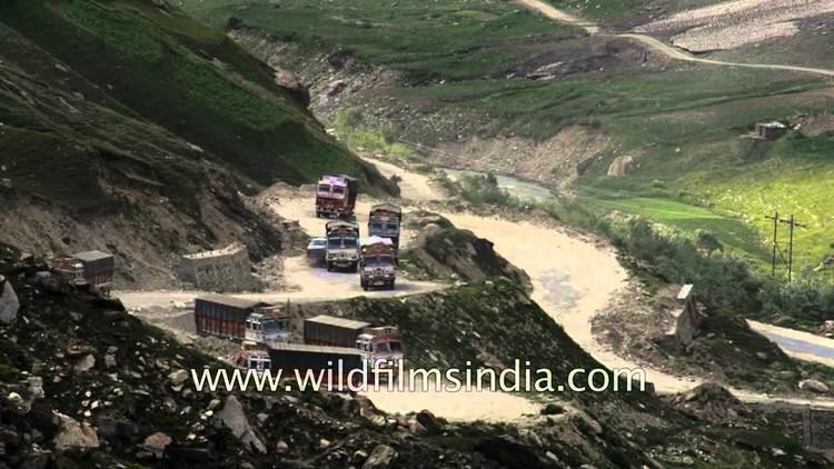 Koksar Trucks move along mountainous roads at Koksar village Himachal