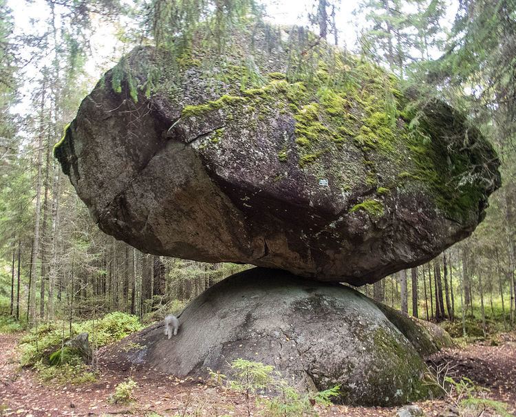 Kummakivi, a large balancing rock in Haukonsalo, Ruokolahti, Finland