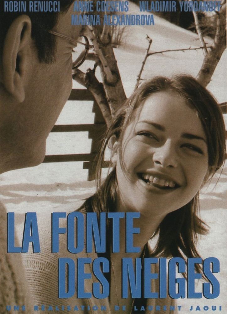 Movie poster of La Fonte des Neiges featuring Marina Aleksandrova smiling while looking at Robin Renucci wearing eyeglasses.