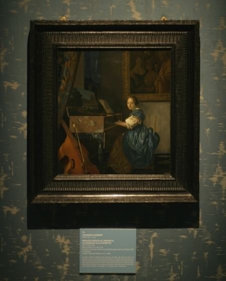 Lady Seated at a Virginal Vermeer39s Paintings in their Frames A Lady Seated at a Virginal