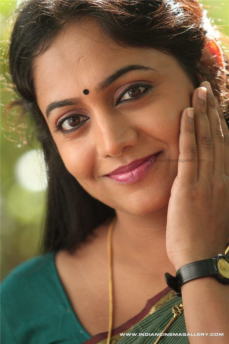 Lakshmi Sharma wearing a black watch