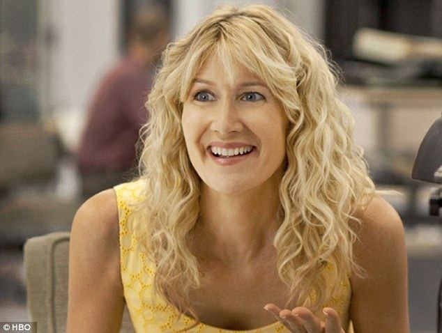 Laura Dern A slightly frazzled looking Laura Dern leads her son